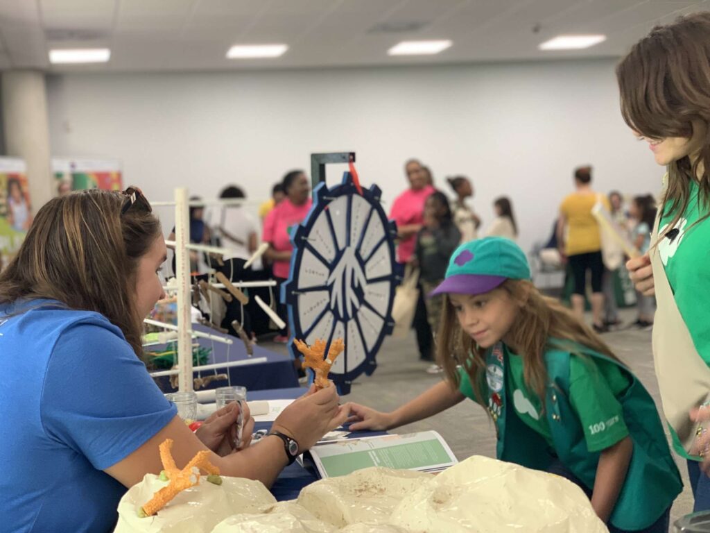 Girl scout learning about coral