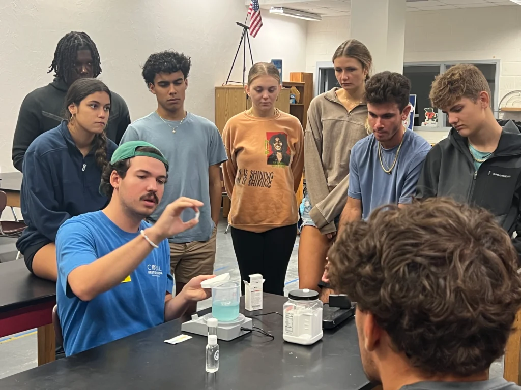 Twelfth grade students from Key West High School observing the “Balancing the Reef” activity which focuses on ocean acidification.