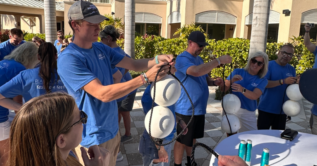 people building floats for coral trees