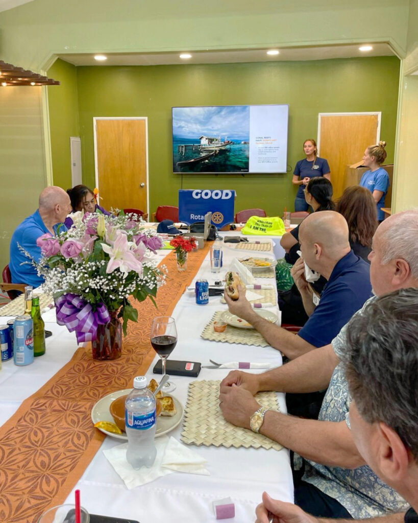 Roxane Boonstra and Nikkie Cox present on coral restoration to community members at the Pago Pago Rotary Club.